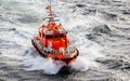 German Pilot Boat crashing through the waves at high speed at sea near Kiel , Germany