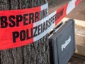 German Police barrier tape with suitcase Royalty Free Stock Photo