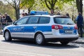 German police car drives on a street