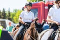 German police horsewoman rides on a police horse Royalty Free Stock Photo