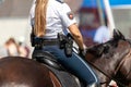 German police horsewoman rides on a police horse Royalty Free Stock Photo