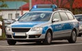 German police patrol car with flashing blue lights