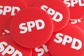 German Politics Badges Concept: Pile of Red SPD Buttons, 3d illustration