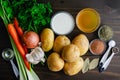 German Potato Soup (Kartoffelsuppe) Ingredients on a Wooden Table Royalty Free Stock Photo