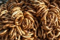 German pretzels stack one over each other, group of thin dry pretzels on rope Royalty Free Stock Photo