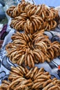 German pretzels stack one over each other, group of thin dry pretzels on rope Royalty Free Stock Photo