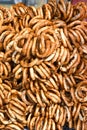 German pretzels stack one over each other, group of thin dry pretzels on rope Royalty Free Stock Photo