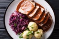 German roast pot Sauerbraten served with potato dumplings and re