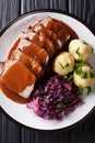 German roast pot Sauerbraten served with potato dumplings and re