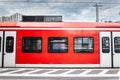 A German S-Bahn train at a suburban station platform, highlighting the efficient commuter rail system connecting suburbs with Royalty Free Stock Photo