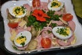 German salad of sausage with eggs