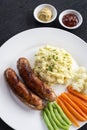 German sausage with mashed potato and vegetables meal Royalty Free Stock Photo