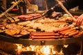 German sausages. The process of cooking over a fire.