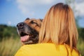 German shepherd and a girl - friendly hugs