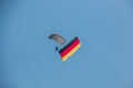 German skydiver in the air with German flag Royalty Free Stock Photo