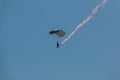 German skydiver in the air with a tail of smoke Royalty Free Stock Photo