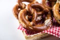 German soft Brezel pretzel with salt in bread basket Royalty Free Stock Photo