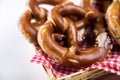 German soft Brezel pretzel with salt in bread basket Royalty Free Stock Photo