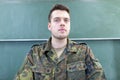 German soldier stands in a classroom