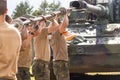 German soldiers cleans the howitzer cannon