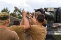 German soldiers cleans the howitzer cannon