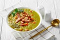 German split pea soup on a white wooden background Royalty Free Stock Photo