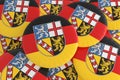 Pile of Saarland Flag Buttons, 3d illustration