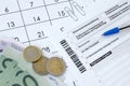 German tax form with pen and european money bills lies on office calendar. Taxpayers in Germany using euro currency to pay taxes Royalty Free Stock Photo