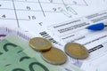 German tax form with pen and european money bills lies on office calendar. Taxpayers in Germany using euro currency to pay taxes Royalty Free Stock Photo