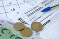 German tax form with pen and european money bills lies on office calendar. Taxpayers in Germany using euro currency to pay taxes Royalty Free Stock Photo