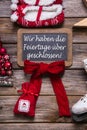German text on a billboard: We have open on christmas holidays.