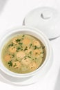 German traditional KARTOFFELSUPPE potato and sausage soup on white background Royalty Free Stock Photo