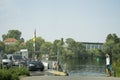 People drive car and biking bicycle go to FerryBoat for crossing Neckar river Royalty Free Stock Photo