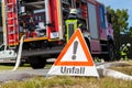 German Unfall accident sign near a fire truck Royalty Free Stock Photo