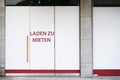 German vacancy sign on storefront - Laden zu mieten means store to let