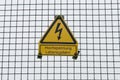 German warning sign `High voltage, danger to life` german: `Hochspannung, Lebensgefahr`