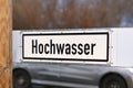 German water flood sign at Rhine river saying `Hochwasser`