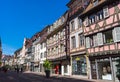 Colmar, France - April 30, 2017: City street with shops with colourful half timber style in Colmar