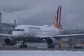 Germanwings plane doing taxi in Munich Airport, MUC snow