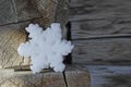 Germany, Ammersee, Wax snow-crystal on wood lodge