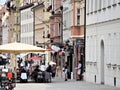 Germany, Augsburg , July 14.th 2018 11 o clock 4 minutes, View to along the Maximilianstrasse street with a Street cafe, row wit