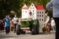 Germany, Niederstetten, Baden Wurttemberg. September 2019. Traditional autumnal Harvest Fest. Decorated tractor with castl