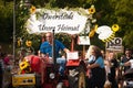 Germany, Baden Wurttemberg, Niederstetten. September 2019. Traditional autumnal Harvest Fest. Decorated tractor and sign with bee