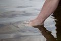 Germany, Baltic Sea, woman, feet in the water Royalty Free Stock Photo