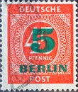 GERMANY, Berlin - CIRCA 1949: a postage stamp from Germany, Berlin - German Post- showing the number forty-five pfenning in a red