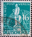 GERMANY, Berlin - CIRCA 1949: a postage stamp from Germany, Berlin in green color showing the Postmaster Heinrich von Stephan Text Royalty Free Stock Photo