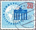 GERMANY, Berlin - CIRCA 1959: a postage stamp from Germany, Berlin showing the Brandenburg Gate with a globe. World Municipal Cong