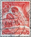 GERMANY, Berlin - CIRCA 1951: a postage stamp from Germany, Berlin showing Children with magnifying glass in front of stamp album Royalty Free Stock Photo