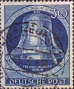 GERMANY, Berlin - CIRCA 1952: a postage stamp from Germany, Berlin showing the liberty bell with the text: New Birth of freedom. C