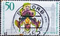 GERMANY, Berlin - CIRCA 1979: a postage stamp from Germany, Berlin showing an orchid lady`s shoe with a sylized hall. Text: Berli